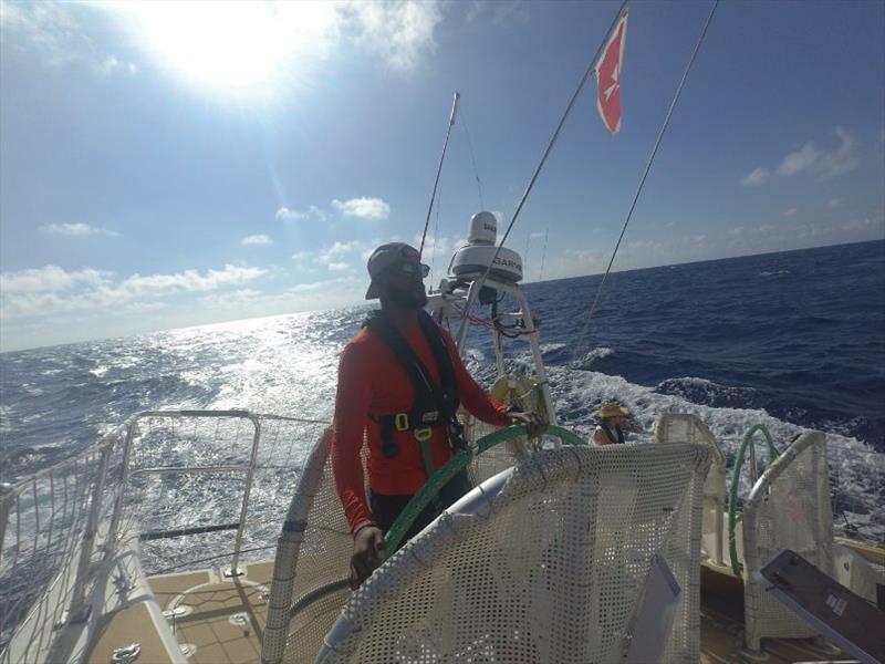 Crew member Jerome, on Ha Long Bay, Viet Nam, takes the helm - The Clipper Race Leg 6 - Race 9, Day 3 photo copyright Clipper Race taken at  and featuring the Clipper 70 class