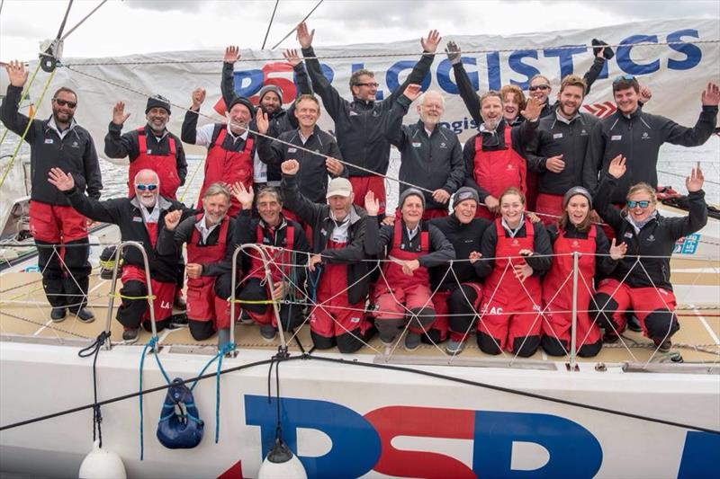 Colin (top row, centre) celebrates arriving into Derry-Lononderry after crossing the Atlantic Ocean photo copyright Clipper Race taken at  and featuring the Clipper 70 class