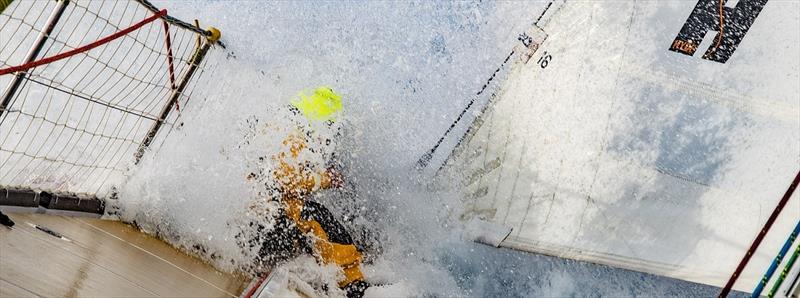 Wave crashing over the bow of a Clipper 70 photo copyright Clipper Race taken at  and featuring the Clipper 70 class