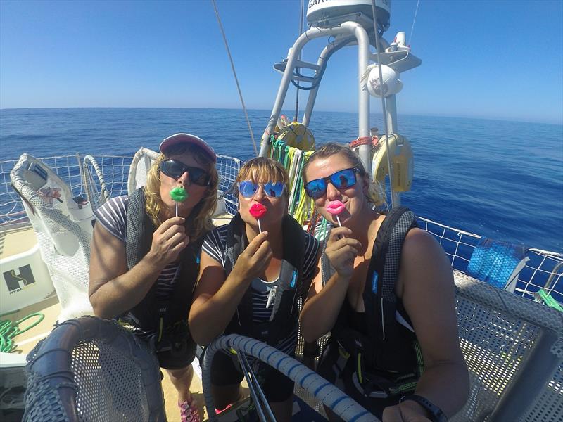 Camaraderie on board Dawn, Kiki and Lyndsay pucker up photo copyright Clipper Race taken at  and featuring the Clipper 70 class