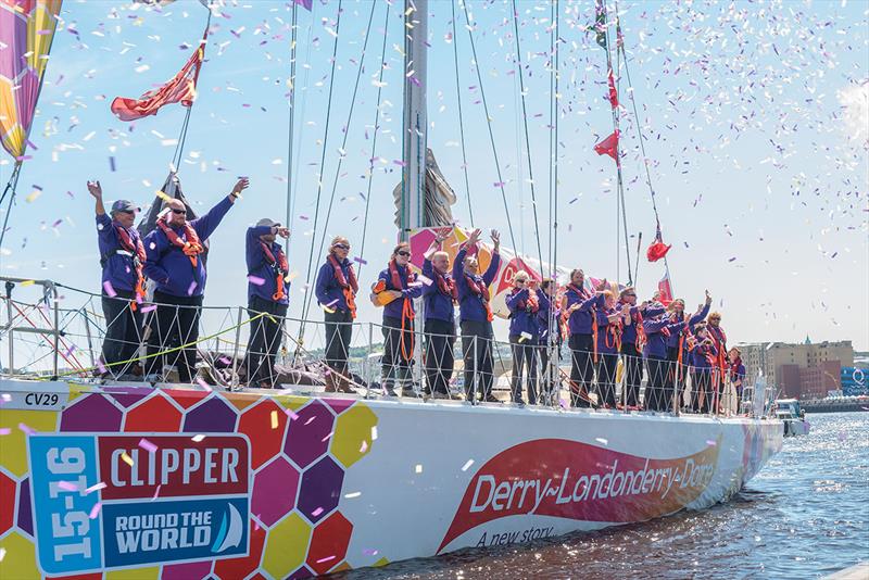 The crew of the Clipper Round the World Yacht Derry-Londonderry-Doire wave farewell to their home port during their departure from Derry-Londonderry in Northern Ireland as they start race 13 - photo © Martin McKeown / Clipper-ventures