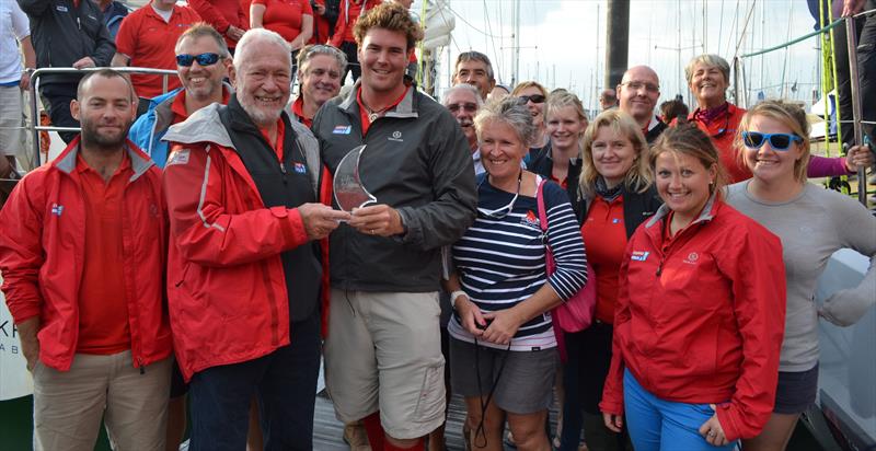 Sir Robin awarding the Clipper Race Yacht Club Bart's Bash trophy to winning team Qingdao photo copyright Clipper Race taken at  and featuring the Clipper Ventures class