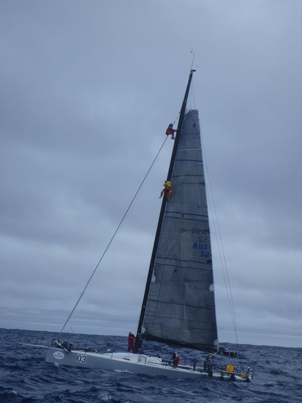 Mission Performance crew member Gavin Reid goes to the assistance of a yacht in distress during the Henri Lloyd Hobart to Whitsundays Race photo copyright Mission Performance taken at  and featuring the Clipper Ventures class