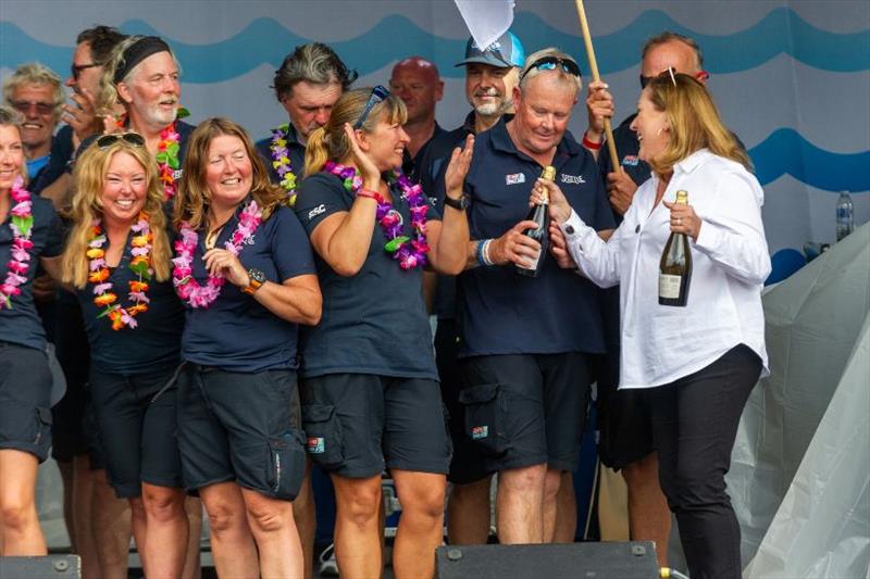 Kiki (3rd from right) celebrating with her team on stage in London - photo © Clipper Race