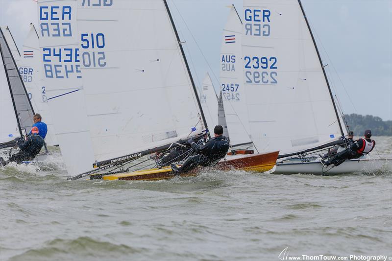 Day 4 at the Contender Worlds at Medmblik photo copyright Thom Touw / www.thomtouw.com taken at Royal Yacht Club Hollandia and featuring the Contender class