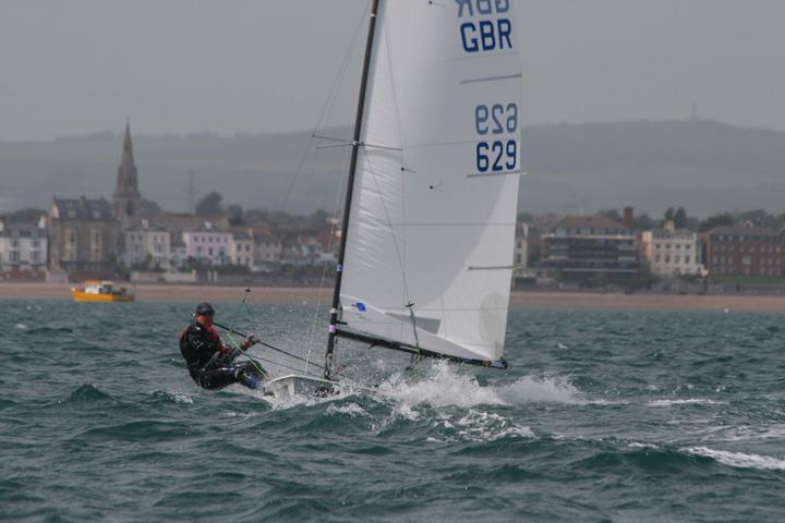 Mark Lee sailing his Contender from Weymouth in 2011 photo copyright CCSC taken at Castle Cove Sailing Club and featuring the Contender class