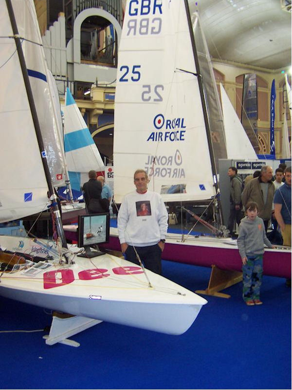 Jim with Dee, the Contender class loan boat photo copyright Chris Boshier taken at RYA Dinghy Show and featuring the Contender class