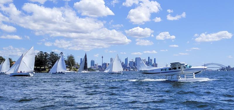 Sydney Couta Boat Week - Seaplane and Coutas on Sydney Harbour photo copyright Couta Boat Association taken at Sorrento Sailing Couta Boat Club and featuring the Couta Boat class