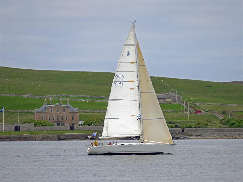 Serenity in full sail reaching the line at Lerwick at the end of leg 1 of the Bergen Shetland Race photo copyright John Anderson taken at Lerwick Boating Club and featuring the Cruising Yacht class