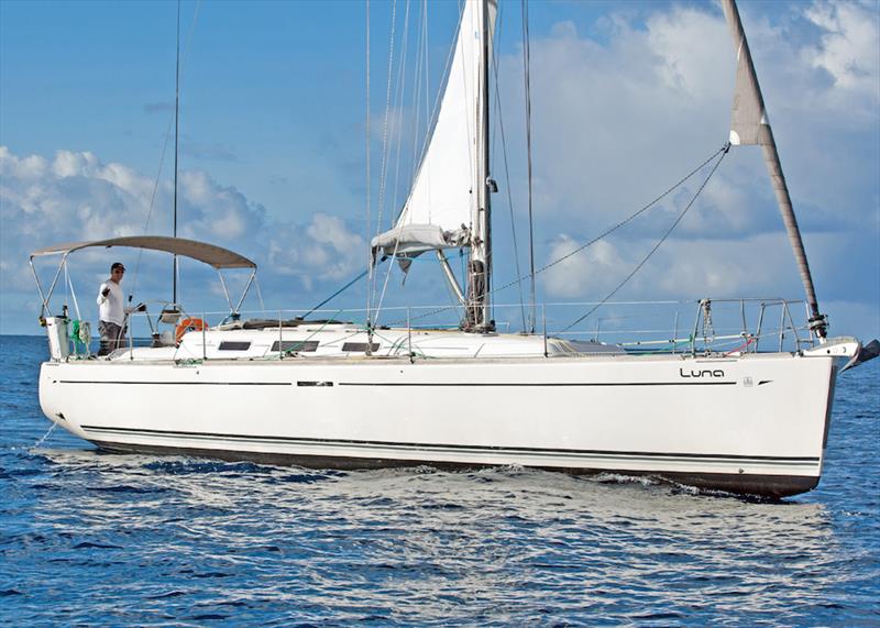 Andreas Berg wins his weight in Mount Gay Rum for breaking the Singlehanded record in the Mount Gay Round Barbados Race photo copyright Peter Marshall / MGRBR taken at Barbados Cruising Club and featuring the Cruising Yacht class