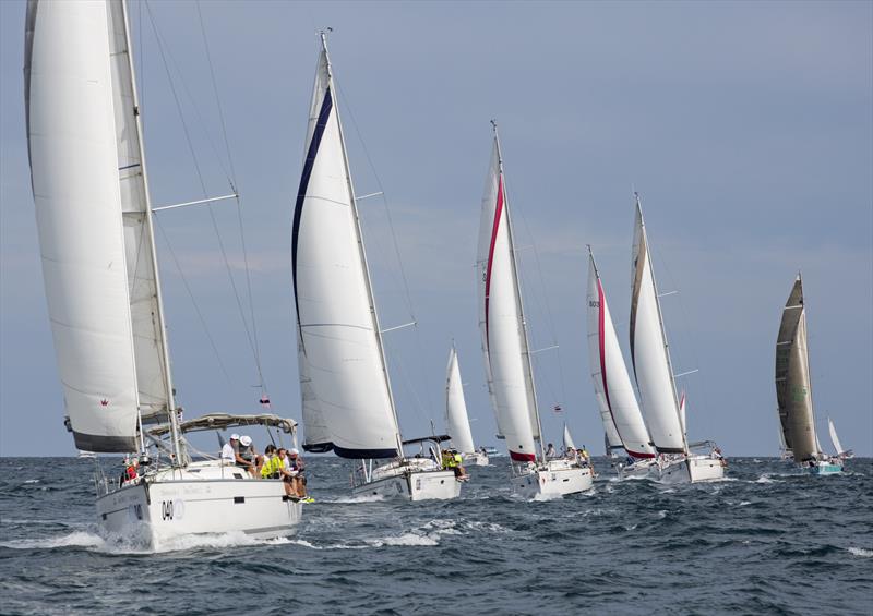 Cruising flotilla on day 3 of the Phuket King's Cup Regatta photo copyright Guy Nowell / Phuket King's Cup taken at Royal Varuna Yacht Club and featuring the Cruising Yacht class