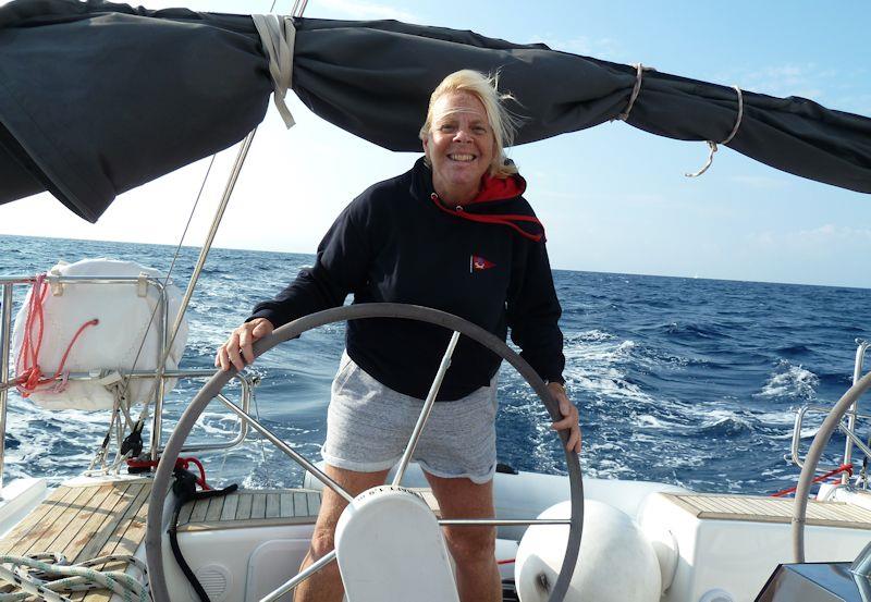 Cruising in Croatia - The author at the helm photo copyright Liz Potter taken at  and featuring the Cruising Yacht class