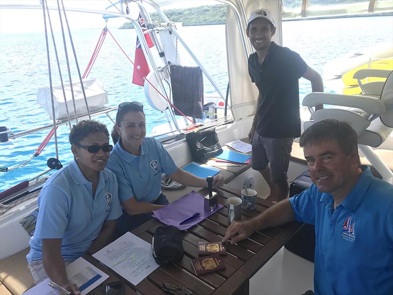 Colin obtaining inward clearance into Lifou Loyalty Islands New Caledonia aboard the Down Under Rally mothership Songlines - Bundaberg Rally photo copyright Down Under Rally taken at  and featuring the Cruising Yacht class