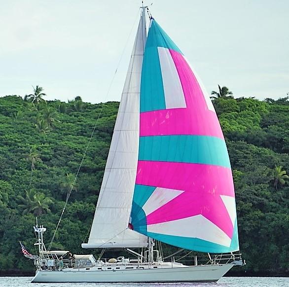 Cailin Lomhara under a mast-head kite photo copyright Larry Green/Cailin Lomhara collection taken at Cruising Yacht Club of Australia and featuring the Cruising Yacht class