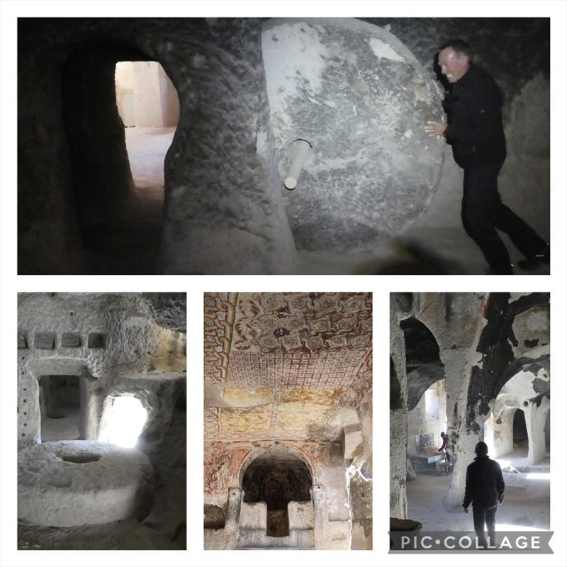 Keslik Monestery all carved into caves in the hillside. Jean trying to work the old stone circle door (hint to Jean, it is locked open with the stick in the middle) photo copyright SV Red Roo taken at  and featuring the Cruising Yacht class