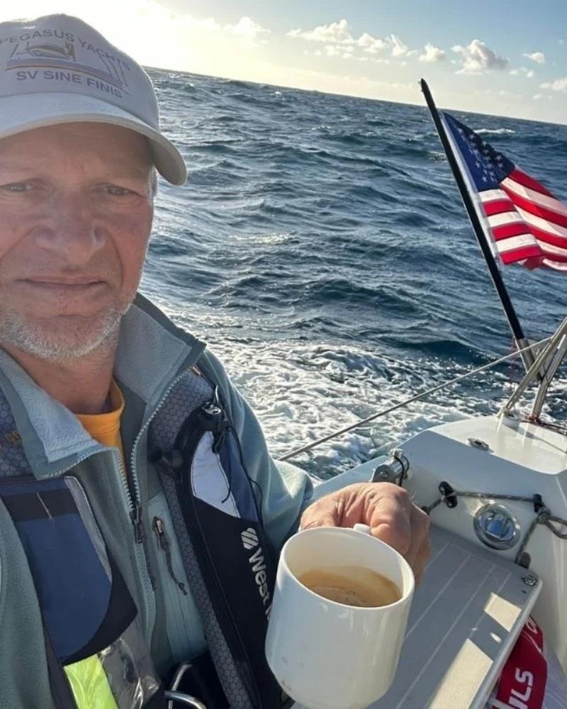 Nico sailing on Pegasus 50 - coffee and flag - photo © Pegasus Yachts