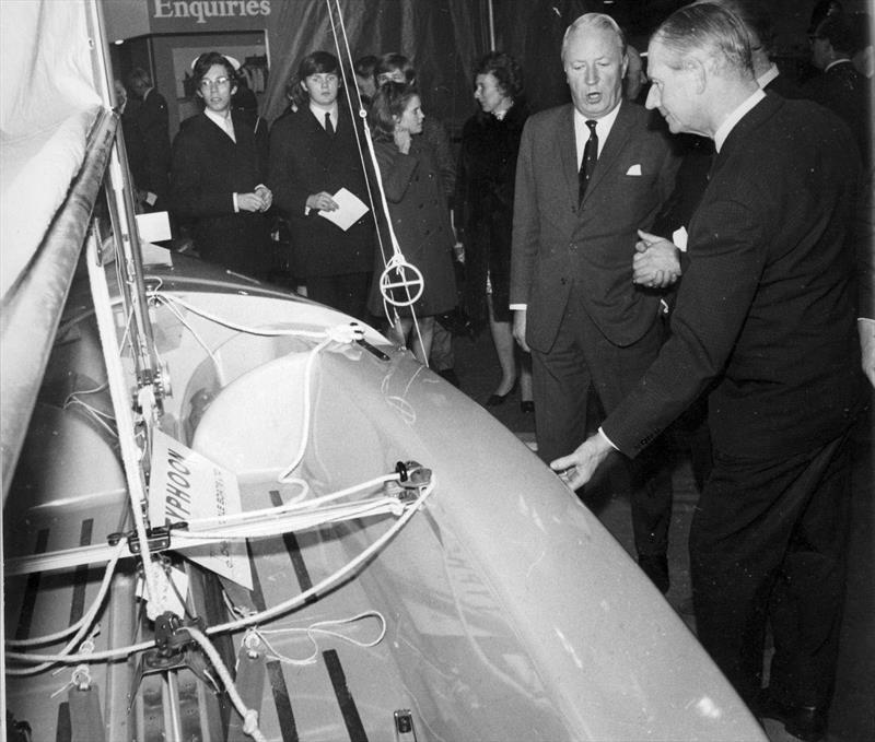 Jack Chippendale (sandwiched between Prince Philip and Edward Heath) demonstrates many of the innovative features of the new Typhoon dinghy. Sadly, the boat, which was years ahead of it's time, would fail to save the fortunes of the Chippendale Boatyard - photo © Chippendale
