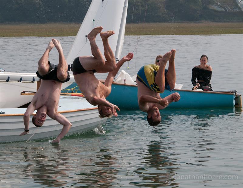 BOD sailors Chris Mathews, Peter McCoy & Piers Strong celebrate their Medium division win Tom Daley style at the Bosham Classic Boat Revival 2014 photo copyright Jonathan Hoare / www.jonathanhoare.com taken at Bosham Sailing Club and featuring the Classic & Vintage Dinghy class