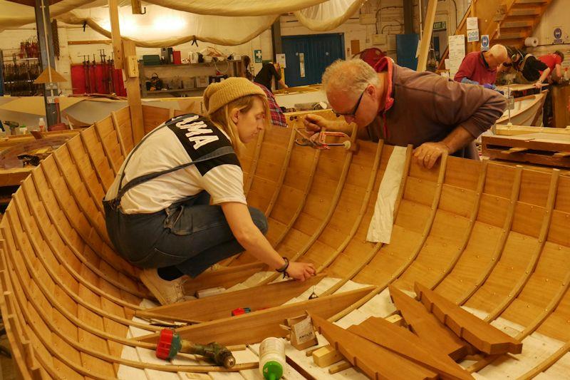 Working at the Boat Building Academy in Lyme Regis photo copyright Boat Building Academy taken at Lyme Regis Sailing Club and featuring the Classic & Vintage Dinghy class