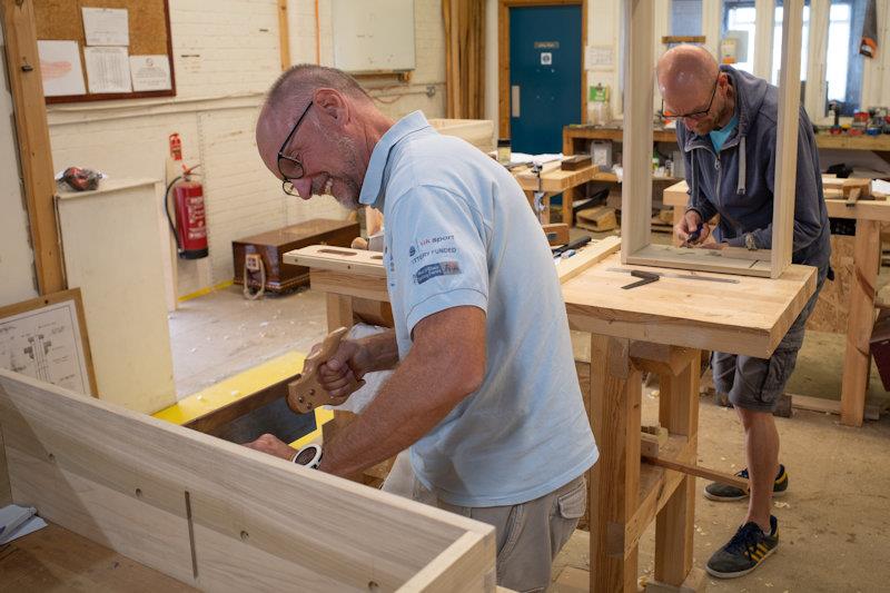 Phil Bevan signed up for the 40-week Boat Building Course at the Lyme Regis Boat Building Academy photo copyright Bijan Nabavi taken at  and featuring the Classic & Vintage Dinghy class