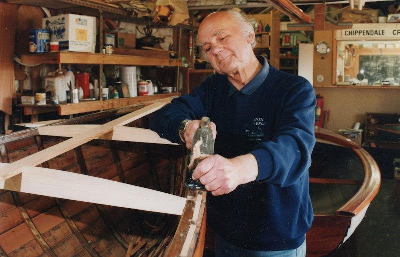 Jack Chippendale showing his craftsman's eye whilst at work on another boat - Thankfully his story has been saved, a rare result for our heritage photo copyright Chippendale family taken at  and featuring the Classic & Vintage Dinghy class