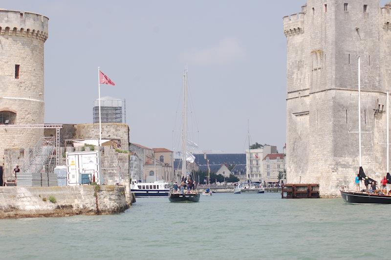 Vintage dinghy events can sail in between the iconic twin towers at La Rochelle photo copyright Dougal Henshall taken at  and featuring the Classic & Vintage Dinghy class