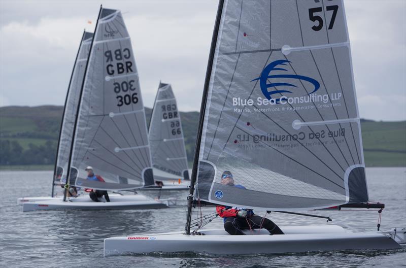 Jon Bassett (306) of RSK and Dave Valentine (66) D-Zero Dealer - in with a good chance of a top ten finish photo copyright Marc Turner / www.pfmpictures.co.uk taken at Largs Sailing Club and featuring the D-Zero class