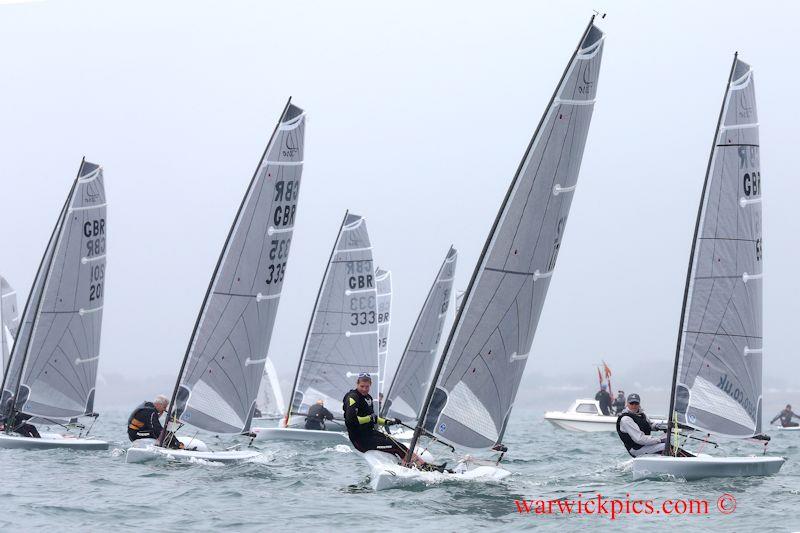  Adam Thompson, Ian Patrick and David Valentine battling it out at the start of race 6 in the D-Zero open meeting at Shoreham photo copyright Warwick Baker / www.warwickpics.com taken at Shoreham Sailing Club and featuring the D-Zero class