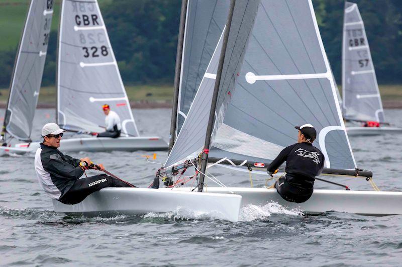 Nick Craig and Dan Holman battling it out during the RSK D-Zero National Championship at Largs photo copyright Tim Olin / www.olinphoto.co.uk taken at Largs Sailing Club and featuring the D-Zero class