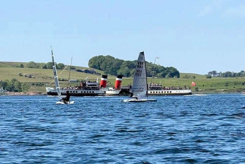 Finley Briggs races against Niel Ritchie in front of the 'Waverley' - D-Zeros at the Largs Chandlers Harken One Design Regatta - photo © Finn McDermott
