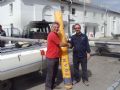 Brian Phipps presents George Love with a new mainsail for his Sprint 15