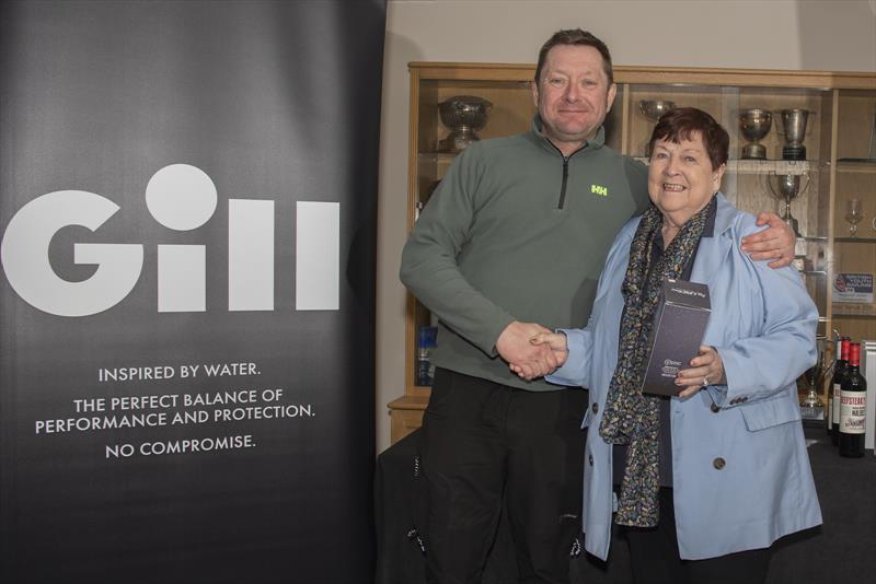 Mark Aldridge accepts his prize from Judith Black at the Gill Dart 15 Winter TT at Grafham Water - photo © Paul Sanwell / OPP