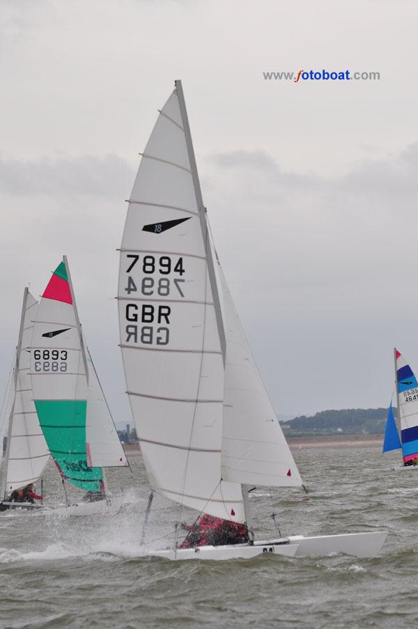 Dart 18 nationals at the Isle of Sheppey photo copyright Richard Janulewicz / www.fotoboat.com taken at Isle of Sheppey Sailing Club and featuring the Dart 18 class