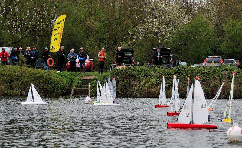 Barrie Martin 49 takes advantage of the port tack lift at the start with Buzz Coleman 17 away well at the starboard end - DF95 Ash Trophy at Guildford (Abbey Meads) photo copyright Roger Stollery taken at Guildford Model Yacht Club and featuring the DF95 class