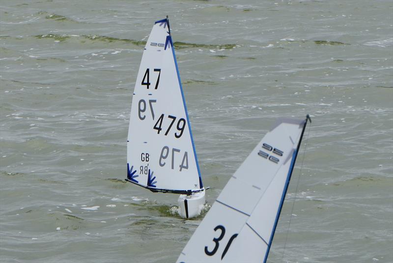 Adrian Tomlinson's A rig sailing away from Rob Owens' B rig in marginal conditions - DF95 Summer Series event 3 at Barton's Point - photo © Alan Houndsell
