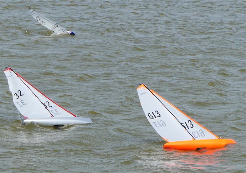 Andrew Nichol (213) and Spencer Pope (32) have their usual close tussle, this time ahead of Rob Owens (479) on DF95 Spring Series at Barton's Point week 8 photo copyright Alan Hounsell taken at East Kent Radio Sailing Club and featuring the DF95 class