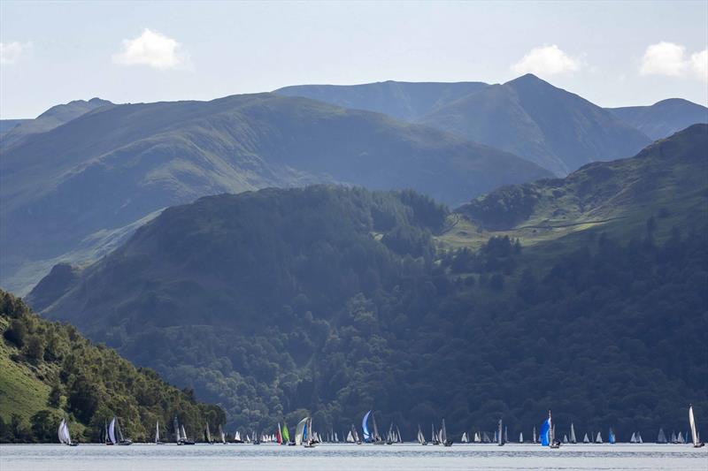 The fleet sailing down the lake on Saturday in the 2019 Birkett photo copyright Tim Olin / www.olinphoto.co.uk taken at Ullswater Yacht Club and featuring the Dinghy class