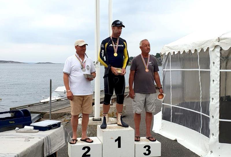 L-R: Bo Petersen, Fredrik Lööf, Greg Wilcox photo copyright Event Media taken at SS Kaparen and featuring the Dinghy class