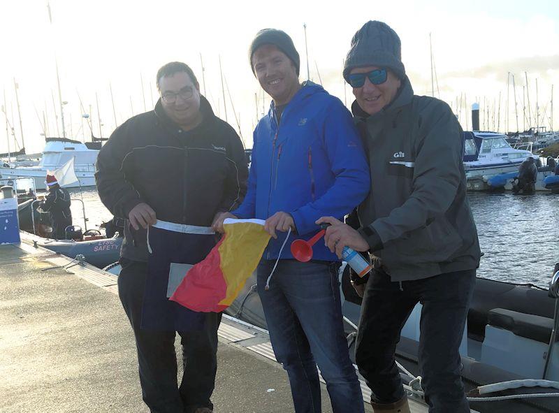 Plenty of willing helpers on the shore during Santa's Sailing Dash at Lymington Town photo copyright Lou Johnson taken at Lymington Town Sailing Club and featuring the Dinghy class