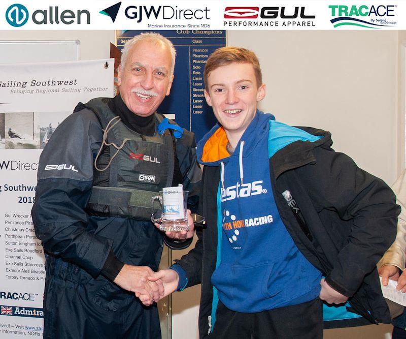 Sutton Bingham's Archie Coates receives Top Youth award from Club Commodore, Phil Bailey - Sutton Bingham Icicle Open Pursuit Race photo copyright Lottie Miles / Sailing SW taken at Sutton Bingham Sailing Club and featuring the Dinghy class