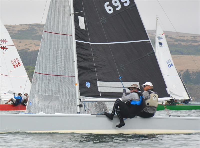 Chris Raney responds to a lull, sliding in from the trapeze as he and Bill Barton approach a layline photo copyright Kimball Livingston taken at Inverness Yacht Club and featuring the Dinghy class