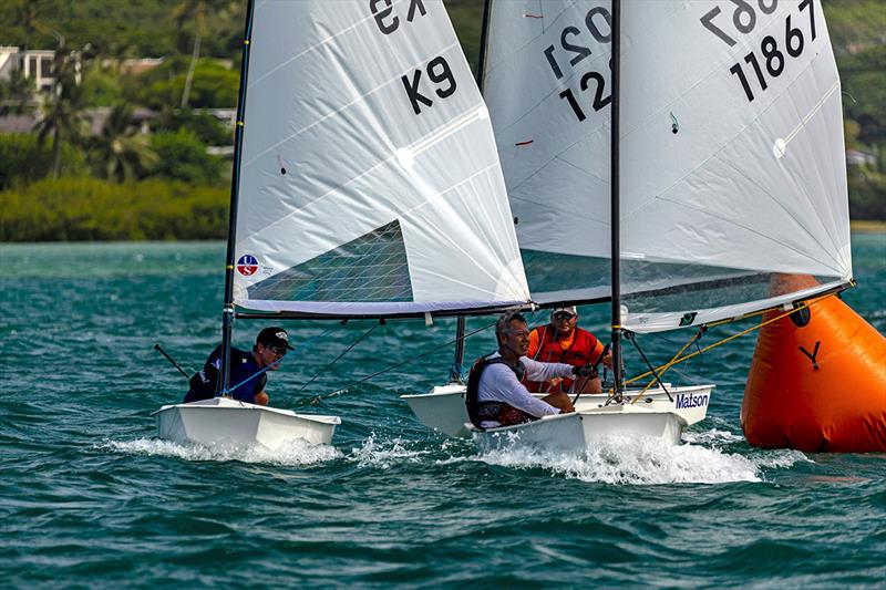 Kui Lim rounds the top mark ahead of Jesse Andrews and Vaughn Seifers. Lim edged Andrews by two points to win his 10th North American Senior title - 2019 El Toro North American Championships photo copyright Kenneth Fitzgerald-Case taken at Kaneohe Yacht Club and featuring the Dinghy class