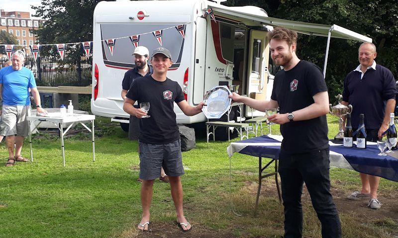 Minima YC Regatta 2020 - Ed Mayley and James Budden take the Enterprise trophy at the al fresco prizegiving while Vice Commodore Robin Broomfield, Sailing Secretary Alex Cane and Commodore Paul Bloomfield look on - photo © John Forbes