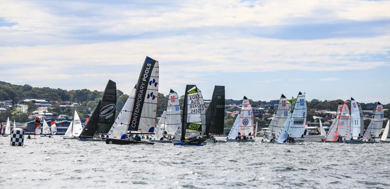 Division 1 start - 2023 Zhik Combined High Schools Sailing Championships photo copyright Red Hot Shotz - Chris Munro taken at Belmont 16ft Sailing Club and featuring the Dinghy class
