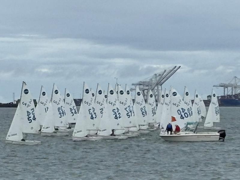 High School Silver fleet start on Sunday with the Port of Long Beach cranes framing the background photo copyright United States Sailing Center taken at  and featuring the Dinghy class