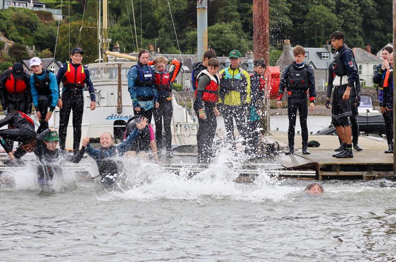 Traditional end with a splashdown - Solway YC Cadet Week photo copyright Nicola McColm taken at Solway Yacht Club and featuring the Dinghy class