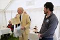 Ian Purkis, project leader, shows the brass plate commemorating the opening - Solway YC opens new fully accessible disabled clubhouse &copy; Finlay Train