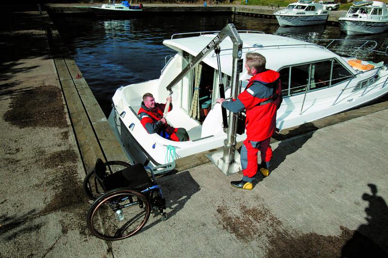 CrewLift is a heavy-duty hoist with a long reach, useful for sailors with a disbility photo copyright Caley Marina taken at  and featuring the Disabled class