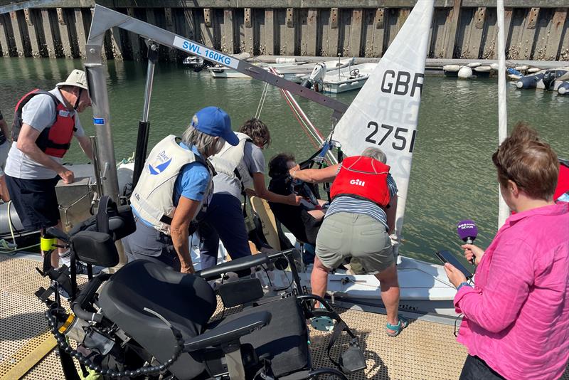 Hoisting a wheelchair user into a Hansa sailing dinghy - Disability Awareness Day in Dartmouth photo copyright Dart Harbour & Navigation Authority taken at  and featuring the Disabled class