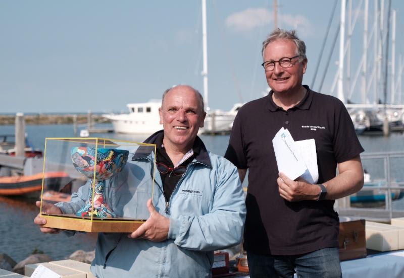 John den Engelsman with the Silver Cup Trophy at the 2019 Yanmar Dragon Gold Cup photo copyright Eric van den Bandt taken at Royal Yacht Club Hollandia and featuring the Dragon class